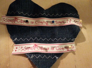 heart with ribbon and stitches